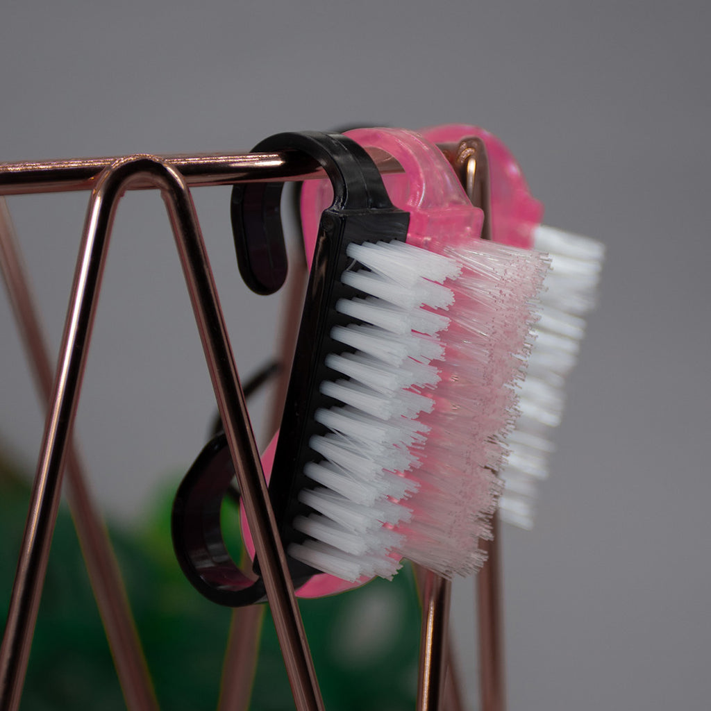 Cepillo para limpieza de uñas.